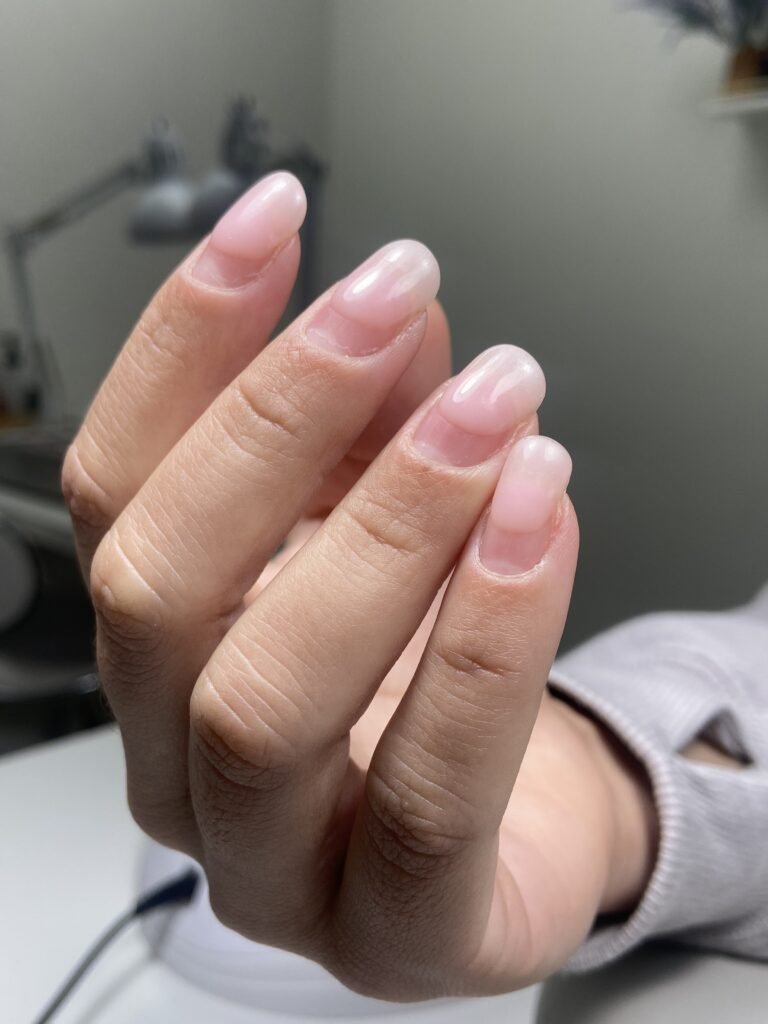 Soft natural pink nails created with russian manicures Tampa technique in a Tampa studio