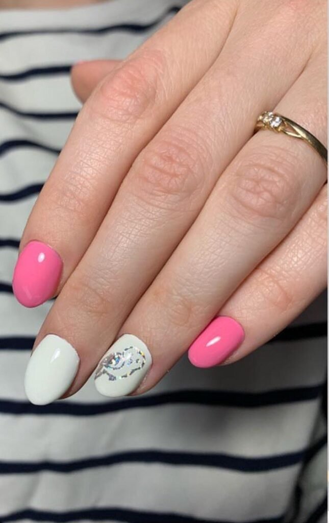 Pink and white manicure at russian nail salon in Tampa, Florida with precise cuticle work and glossy finish.