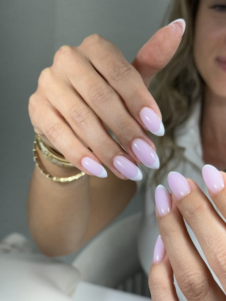 Natural soft pink russian nails tampa with clean shape and glossy finish in Tampa, Florida