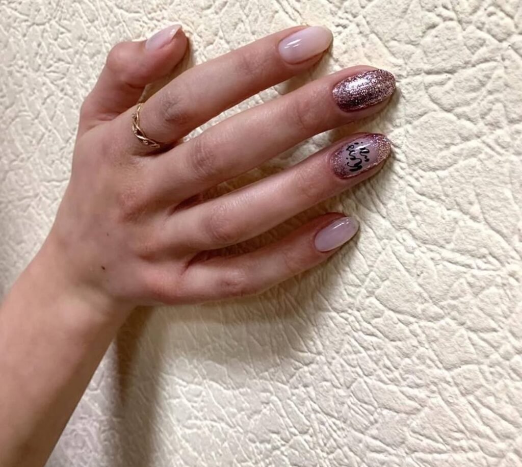 Soft pink builder gel manicure on natural nails in Tampa with subtle shimmer accent