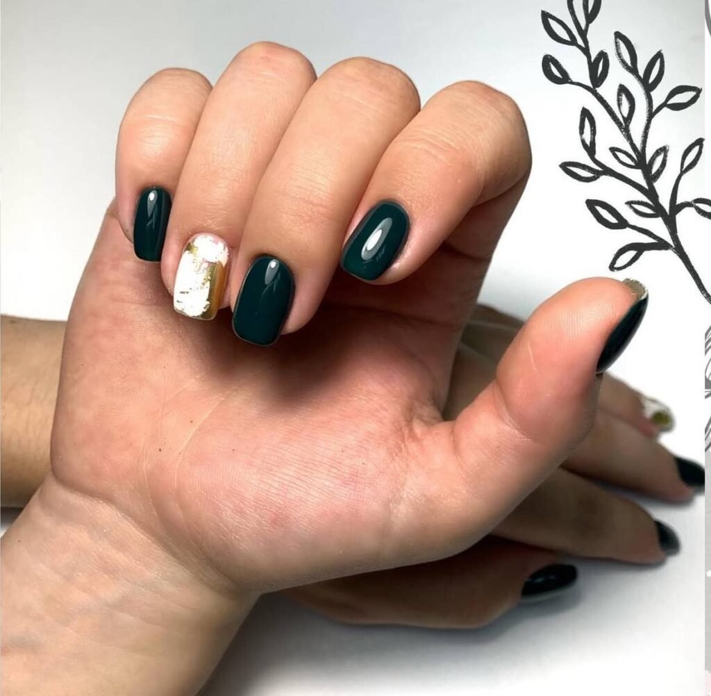 Deep green builder gel manicure in Tampa with gold accent nail at Nail Boss Studio