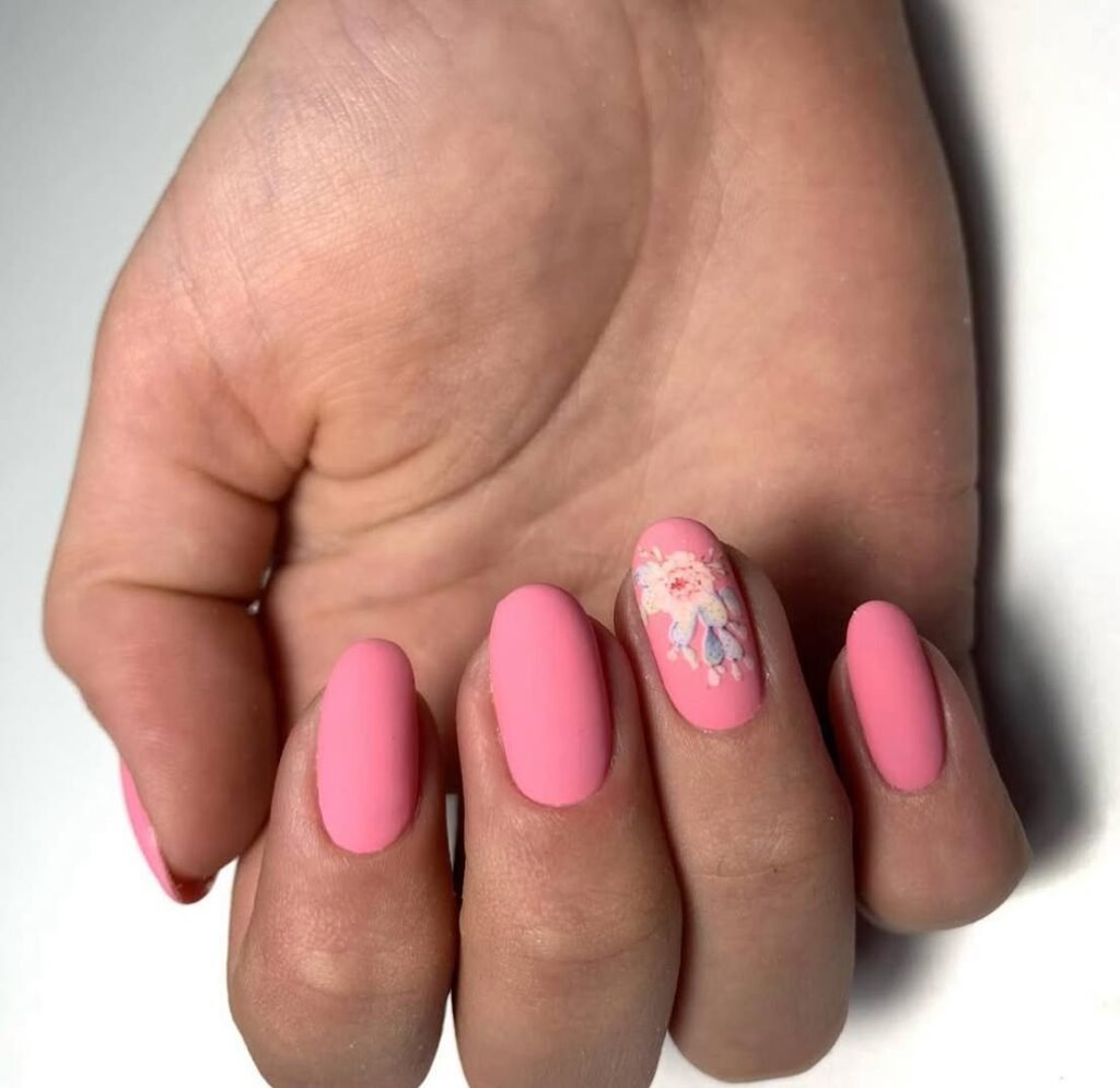 Soft pink builder gel manicure Tampa with floral accent nail design in Tampa Florida