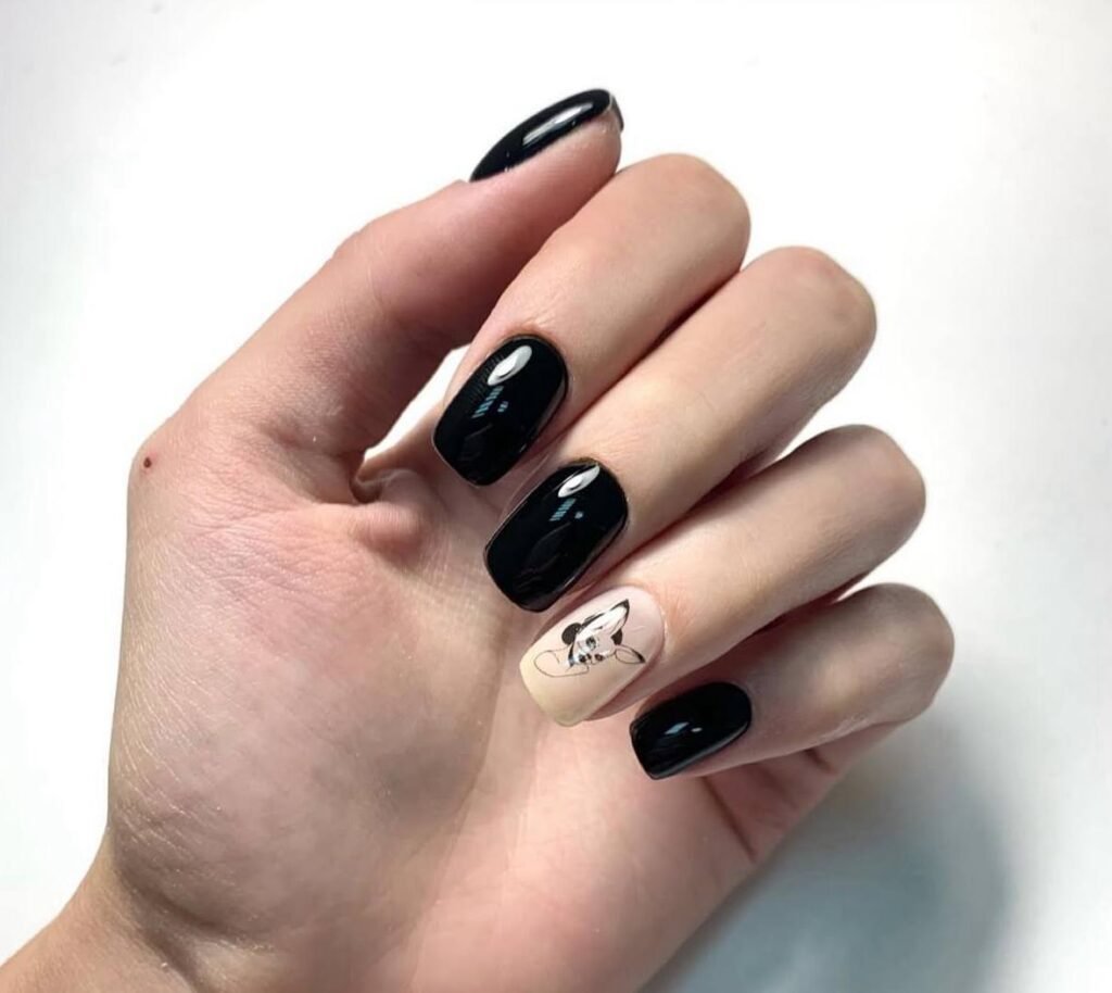 Elegant black nails with accent design created using dry manicure in Tampa, Florida