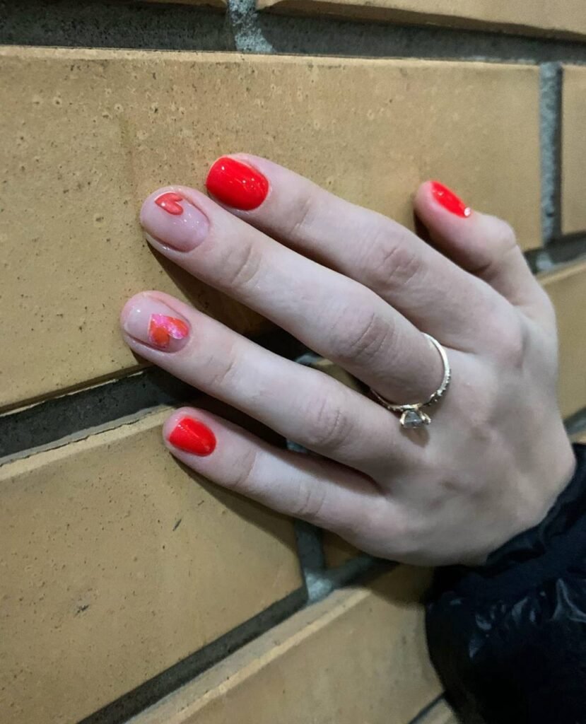 Soft red feminine nails with delicate design european manicure near me in Tampa Florida