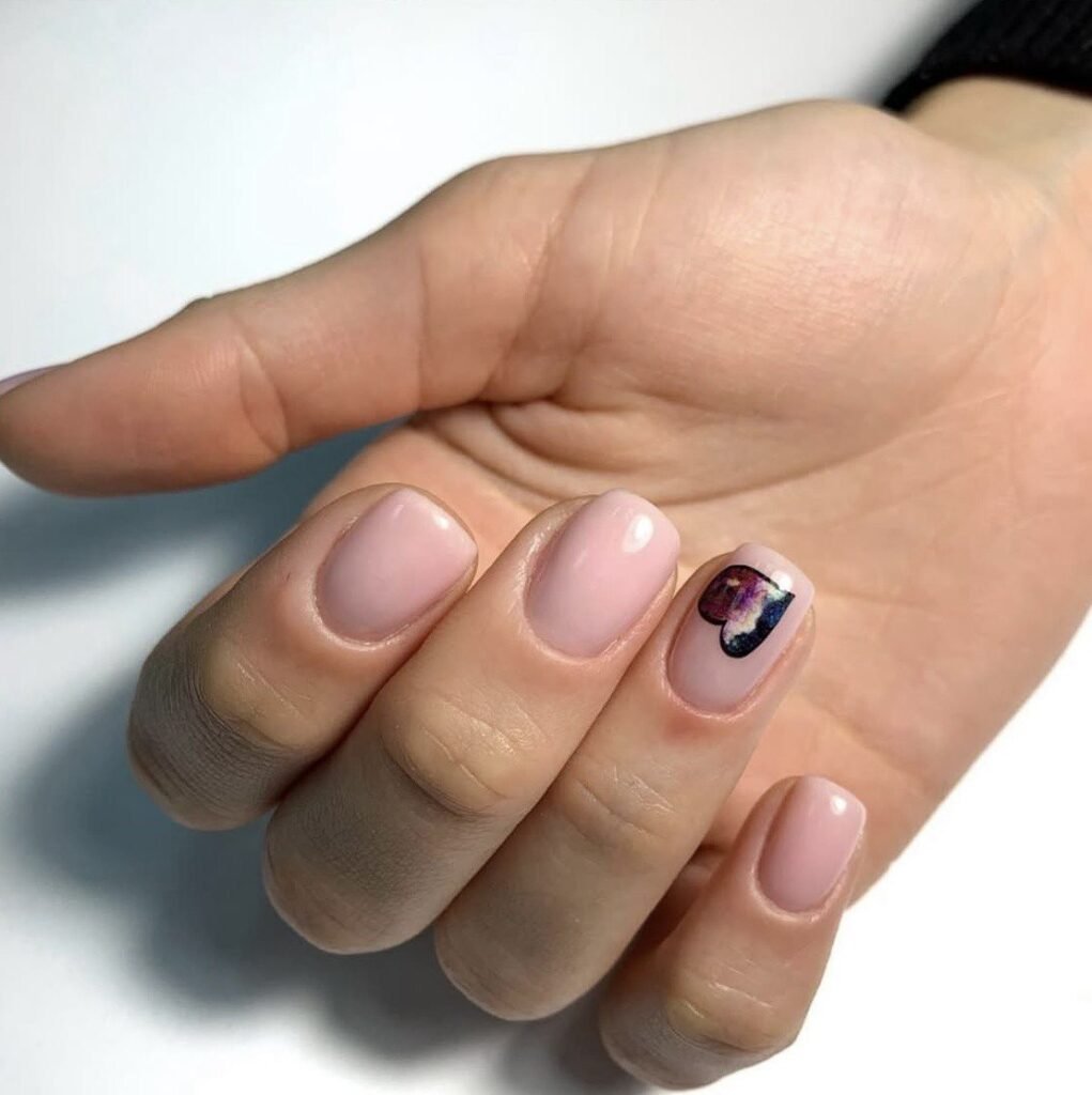 Soft pink european manicure on natural nails with minimal design in Tampa, Florida