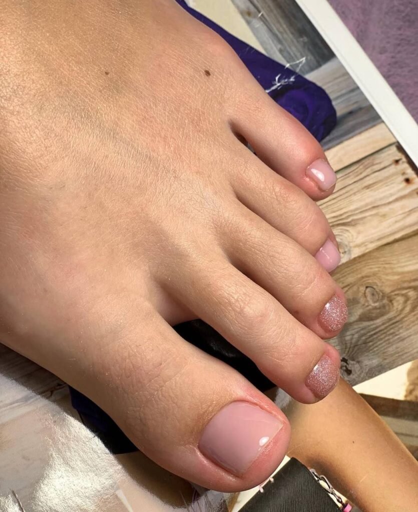 Natural glossy gel pedicure Tampa with clean cuticles and soft pink finish in Tampa Florida