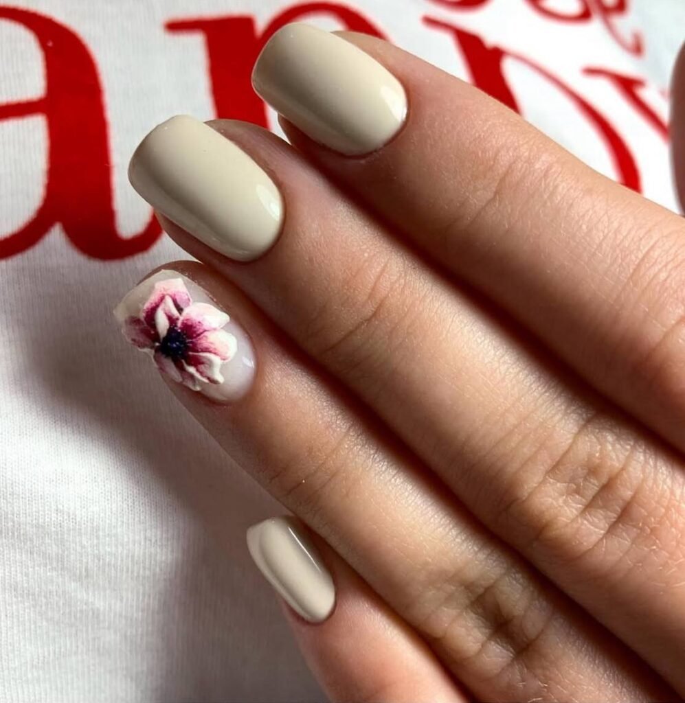 Beige hard gel russian manicure with delicate floral accent at Nail Boss Studio Tampa, Florida