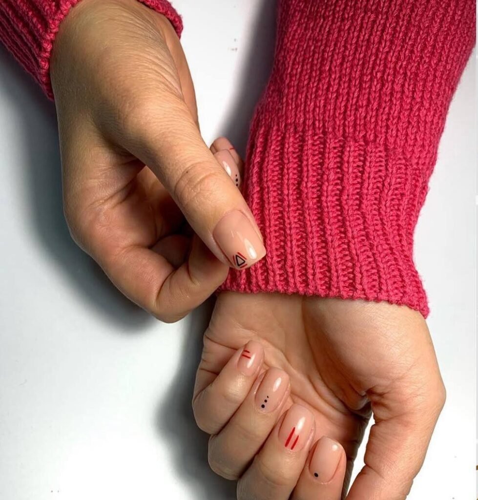 Minimal nude nails with red accents russian manicure Tampa Florida clean design