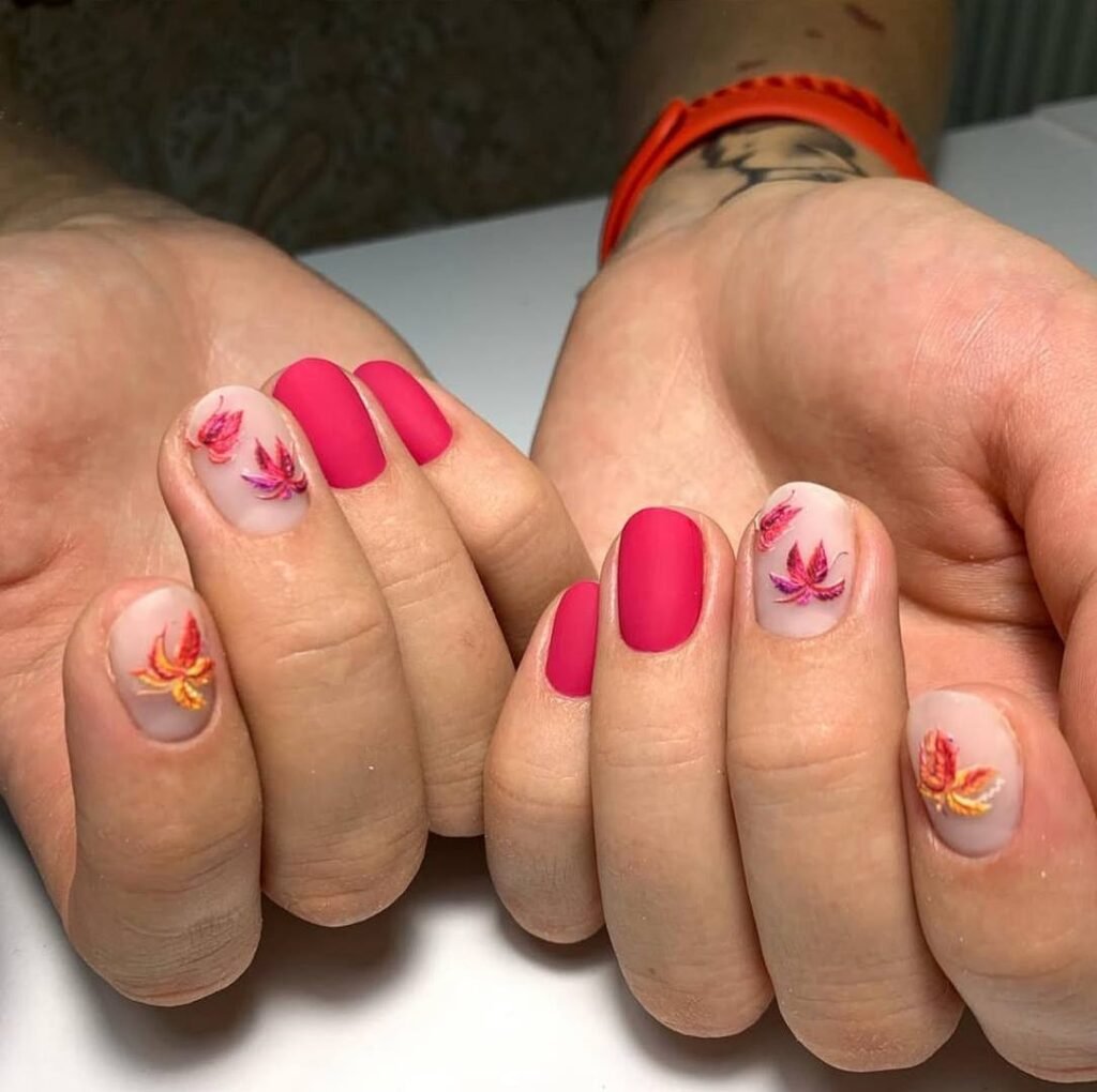 Soft matte pink nails with autumn leaf design created with russian manicures Tampa in Tampa Florida