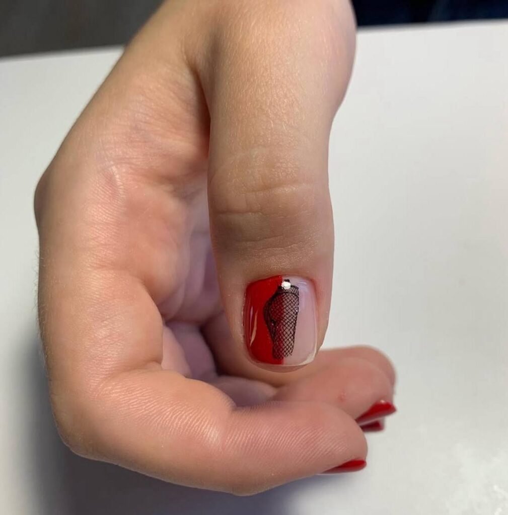 Elegant red and nude manicure with lace design created with russian Nails Tampa technique at Nail Boss Studio in Tampa, Florida.