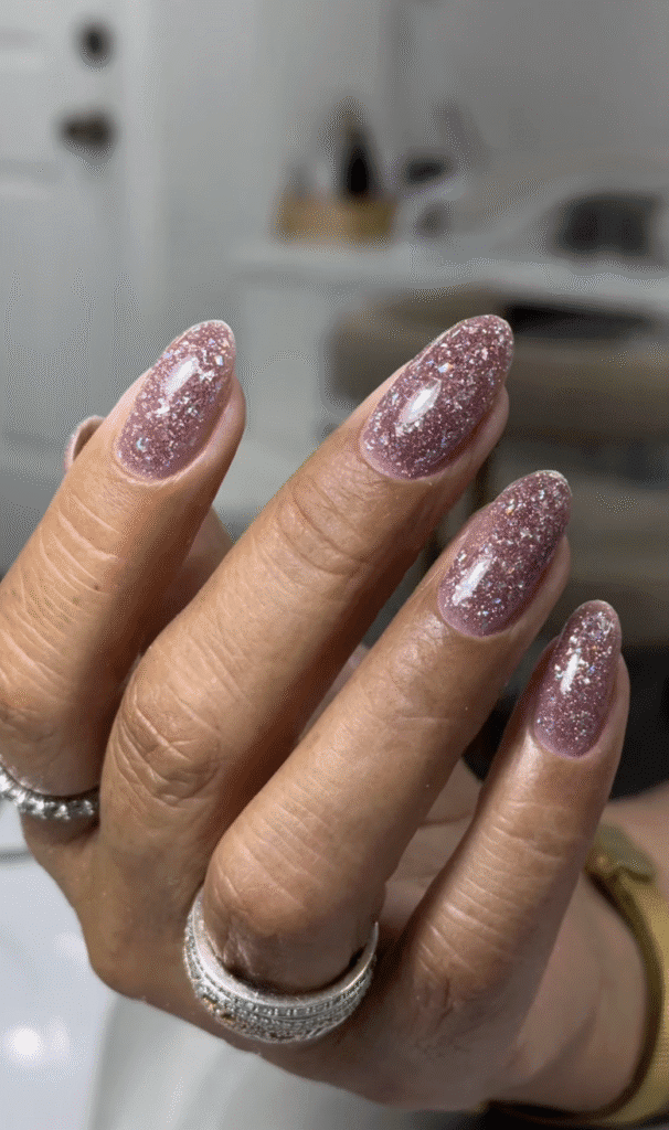 builder gel manicure near me in Tampa Florida with soft pink shimmer nails and glossy finish