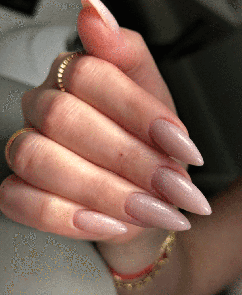 Soft nude almond nails with builder gel Tampa finish in Tampa Florida with clean glossy structure