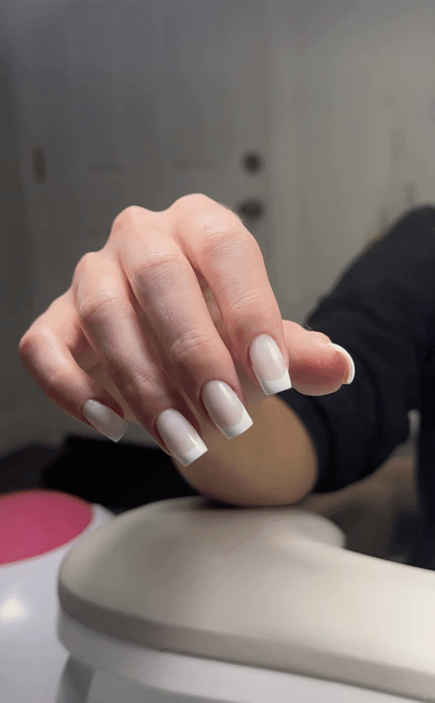Soft neutral nails with clean cuticles created with european manicure near me technique in Tampa