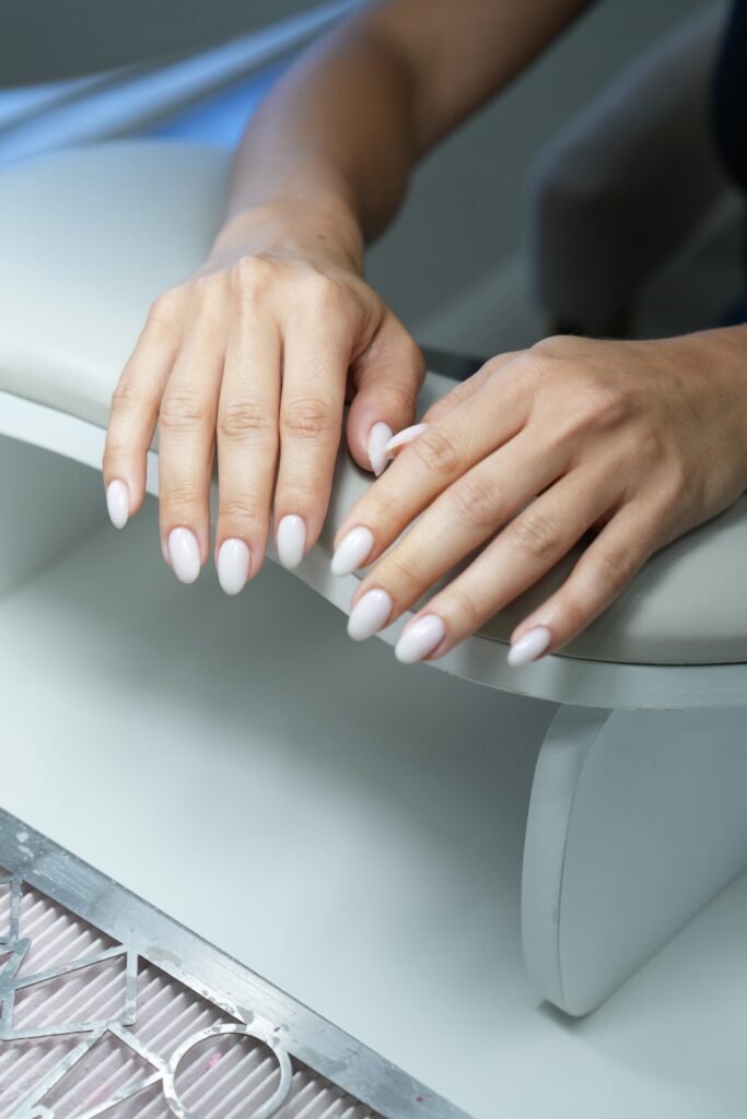 Soft natural nails with european manicure in Tampa Florida, clean shape and minimal elegant finish