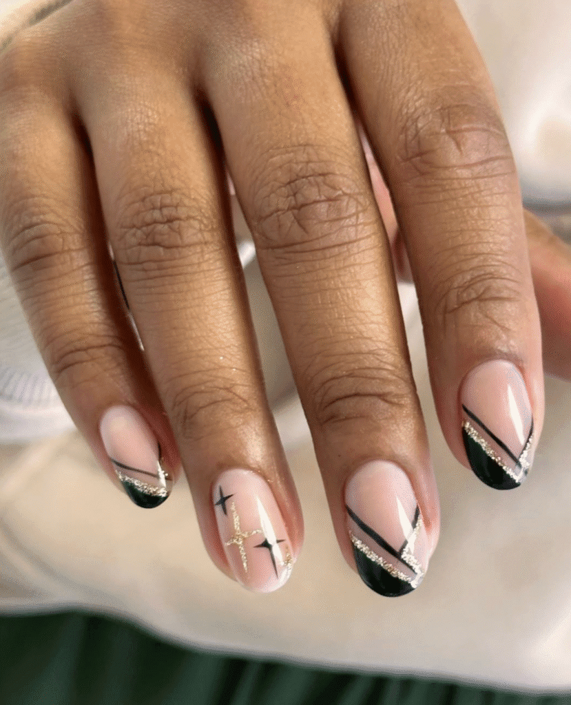 Elegant russian Manicure near me in Tampa with black tips and gold accents on natural nails