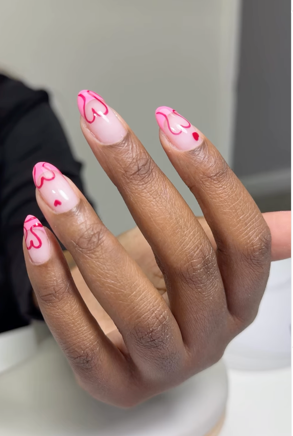 Flawless russian manicure on natural nails with soft pink base and red minimal design in Tampa, Florida