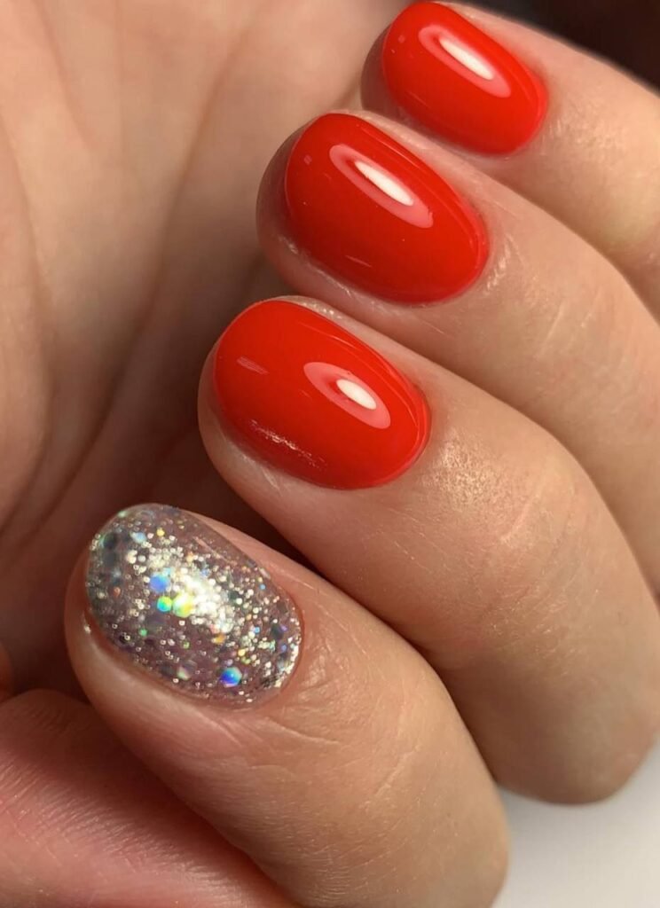 Glossy red nails with glitter accent created with russian manicure Tampa technique in Tampa Florida