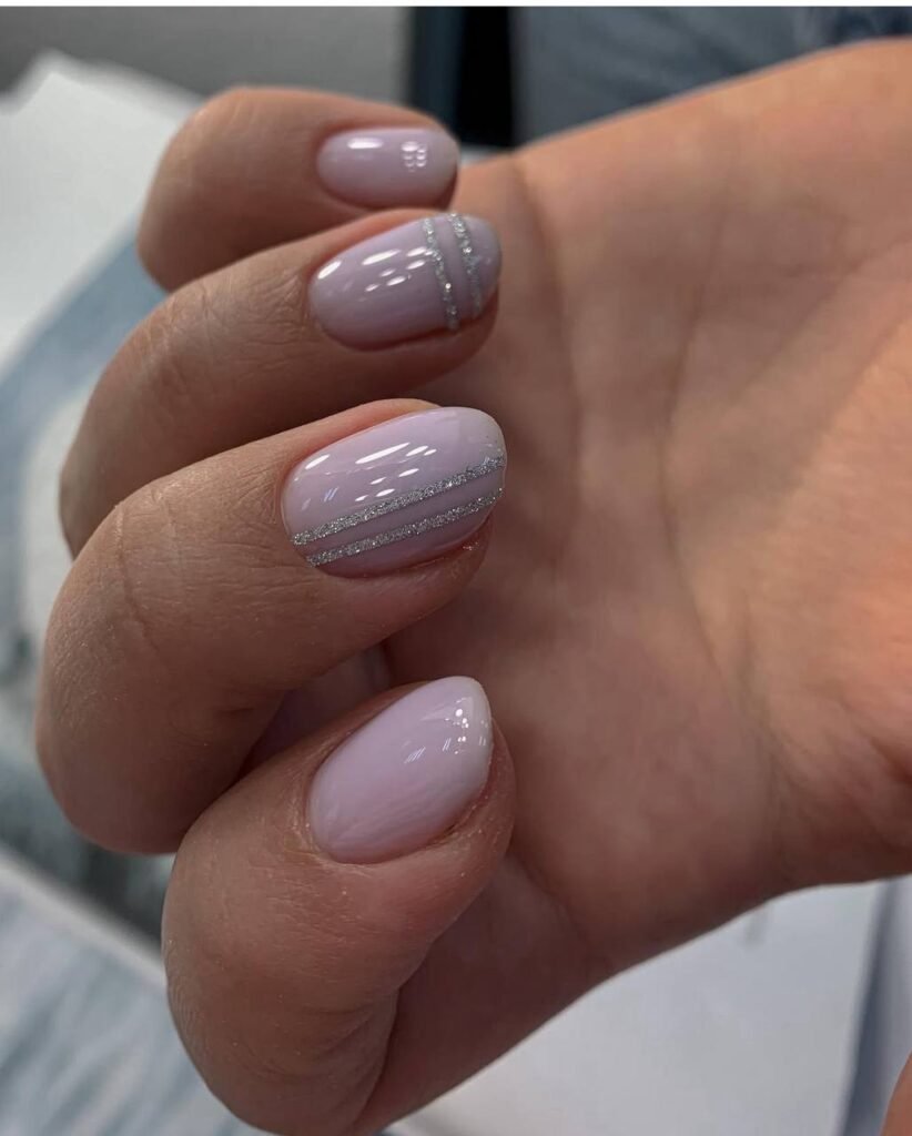 Soft pink glossy nails with shimmer lines, russian manicure Tampa style in Tampa Florida