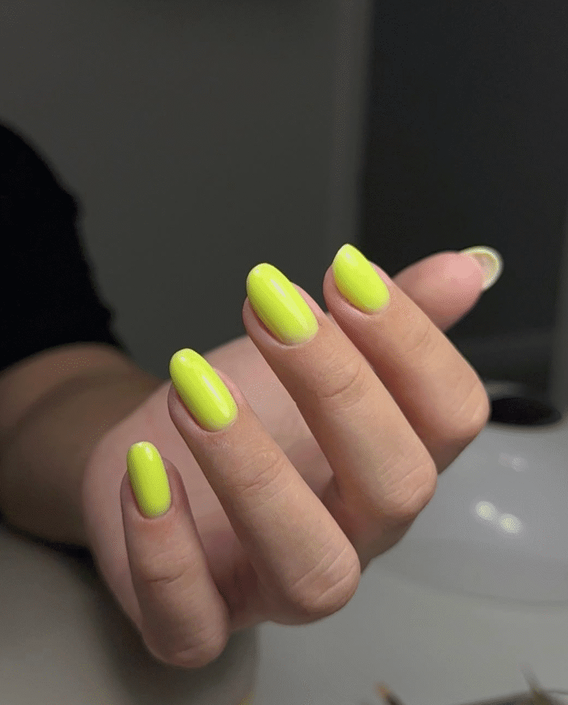 Bright neon green clean nails created with russian manicures Tampa technique in Tampa, Florida
