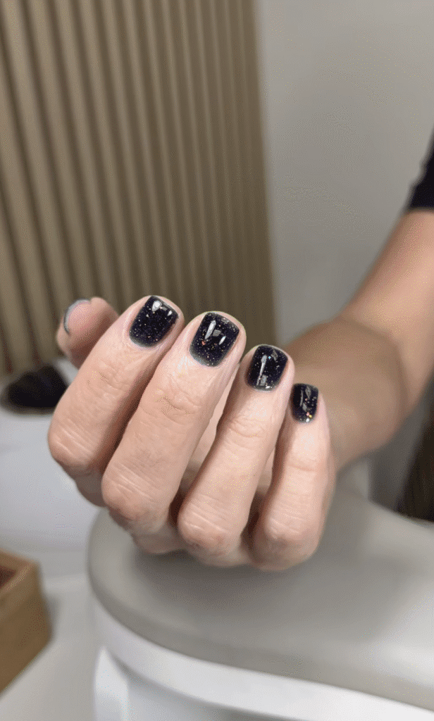 Short dark shimmer nails with russian manicures Tampa style, glossy finish in Tampa Florida