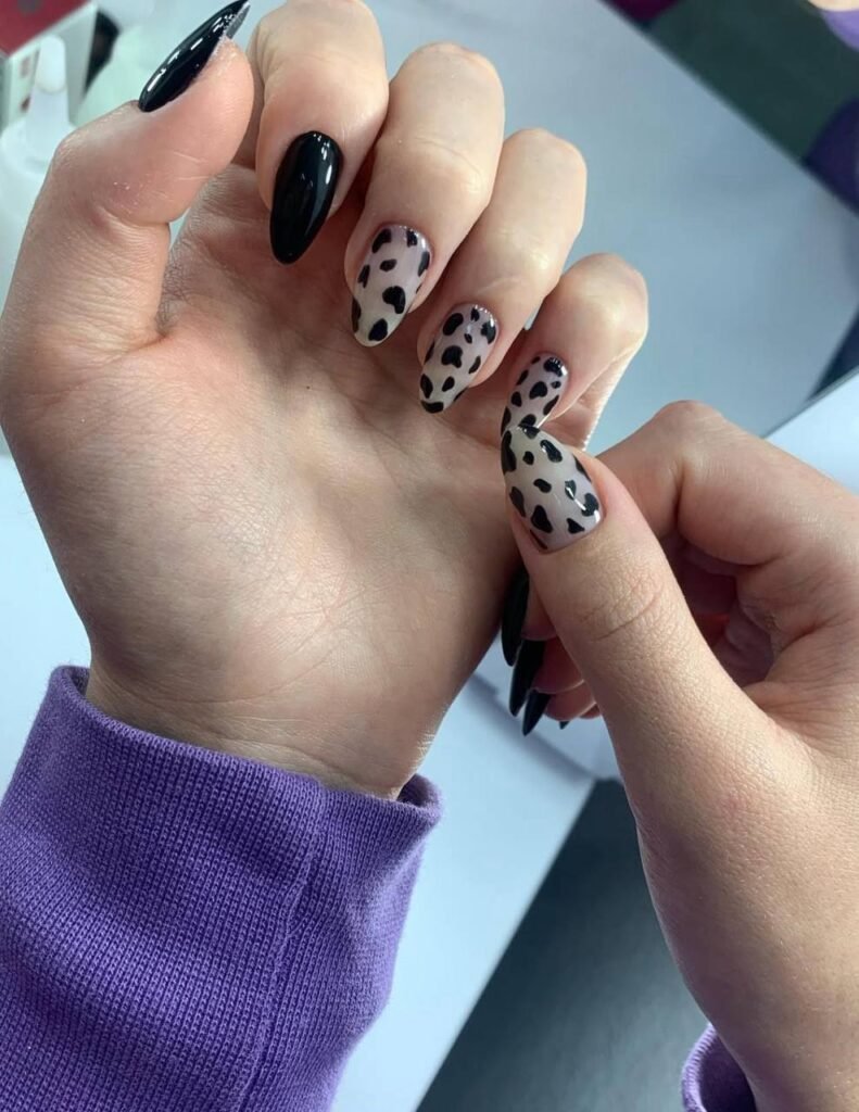 Elegant black and neutral manicure at russian nail salon in Tampa Florida with precise cuticle work