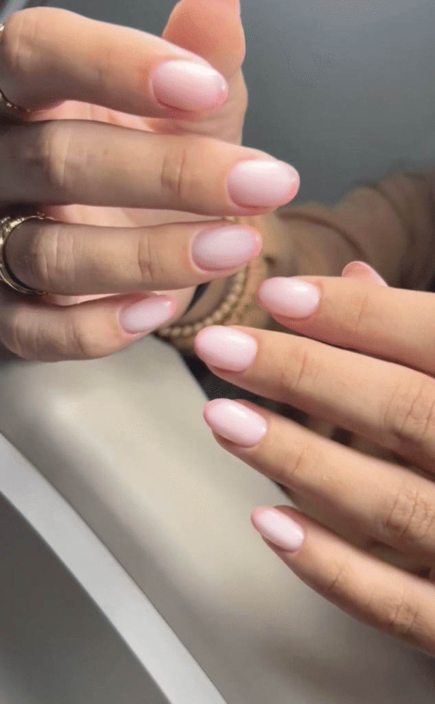 Soft pink russian nails in Tampa with clean cuticle work and glossy natural finish