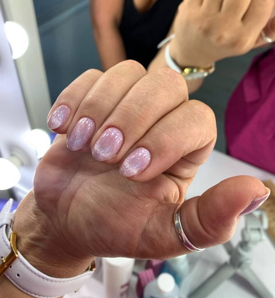 Soft pink shimmer russian Nails Tampa manicure with clean cuticle work in Tampa Florida