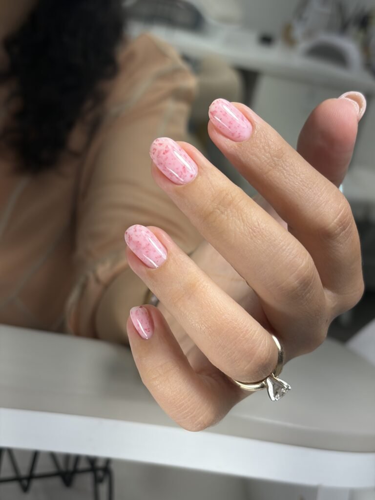 Soft pink hard gel russian manicure with glossy finish at Nail Boss Studio Tampa, Florida.