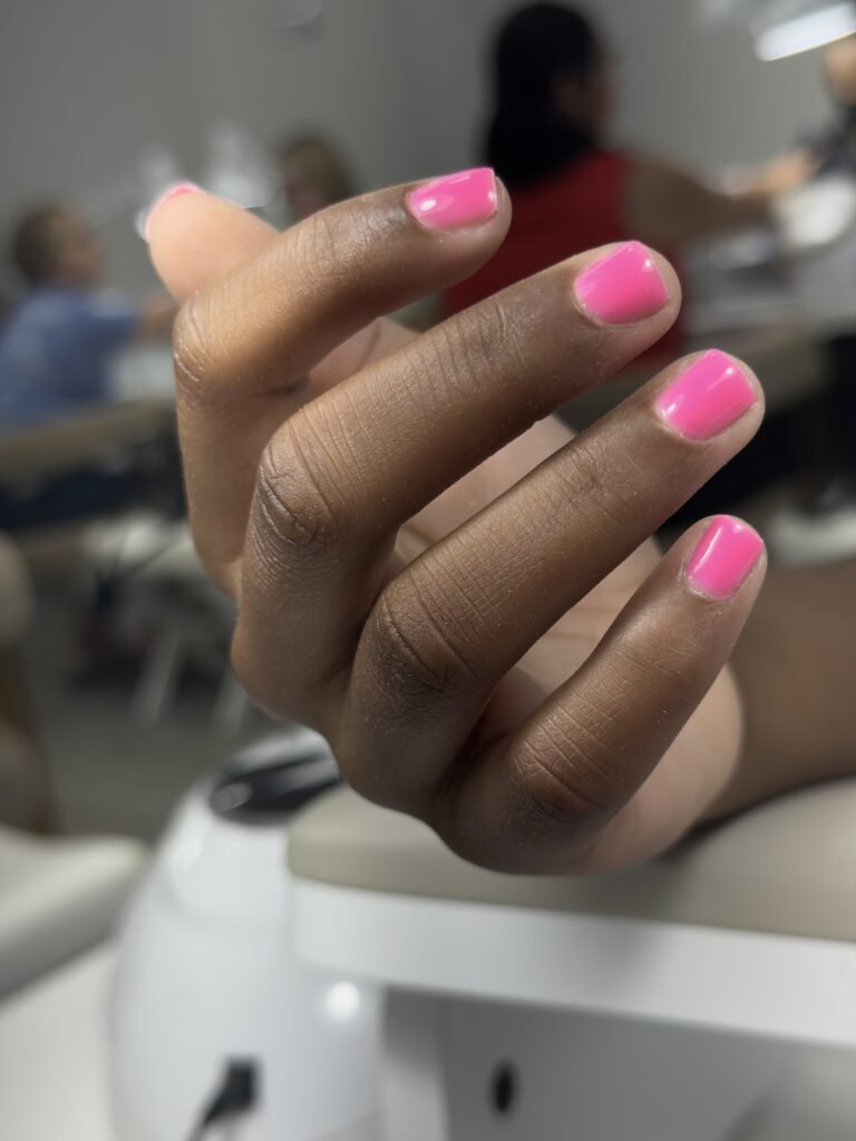 Soft pink nails created at a russian manicure salon in Tampa, Florida with glossy natural finish.