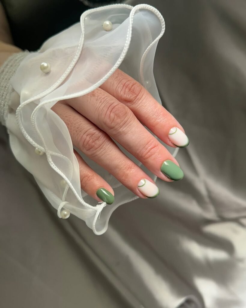 Elegant sage green dry manicure in Tampa, Florida with minimalist nail art and glossy finish.