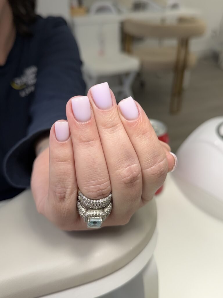 Soft pink hard gel russian manicure in Tampa, Florida with clean square shaping at Nail Boss Studio.