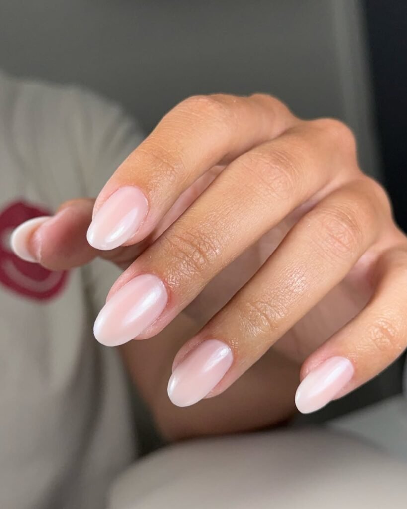 Elegant soft pink russian manicures Tampa with almond-shaped nails at Nail Boss Studio Tampa.