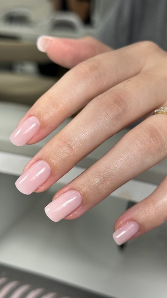 Soft pink tampa russian manicure with glossy square nails at Nail Boss Studio Tampa, Florida.