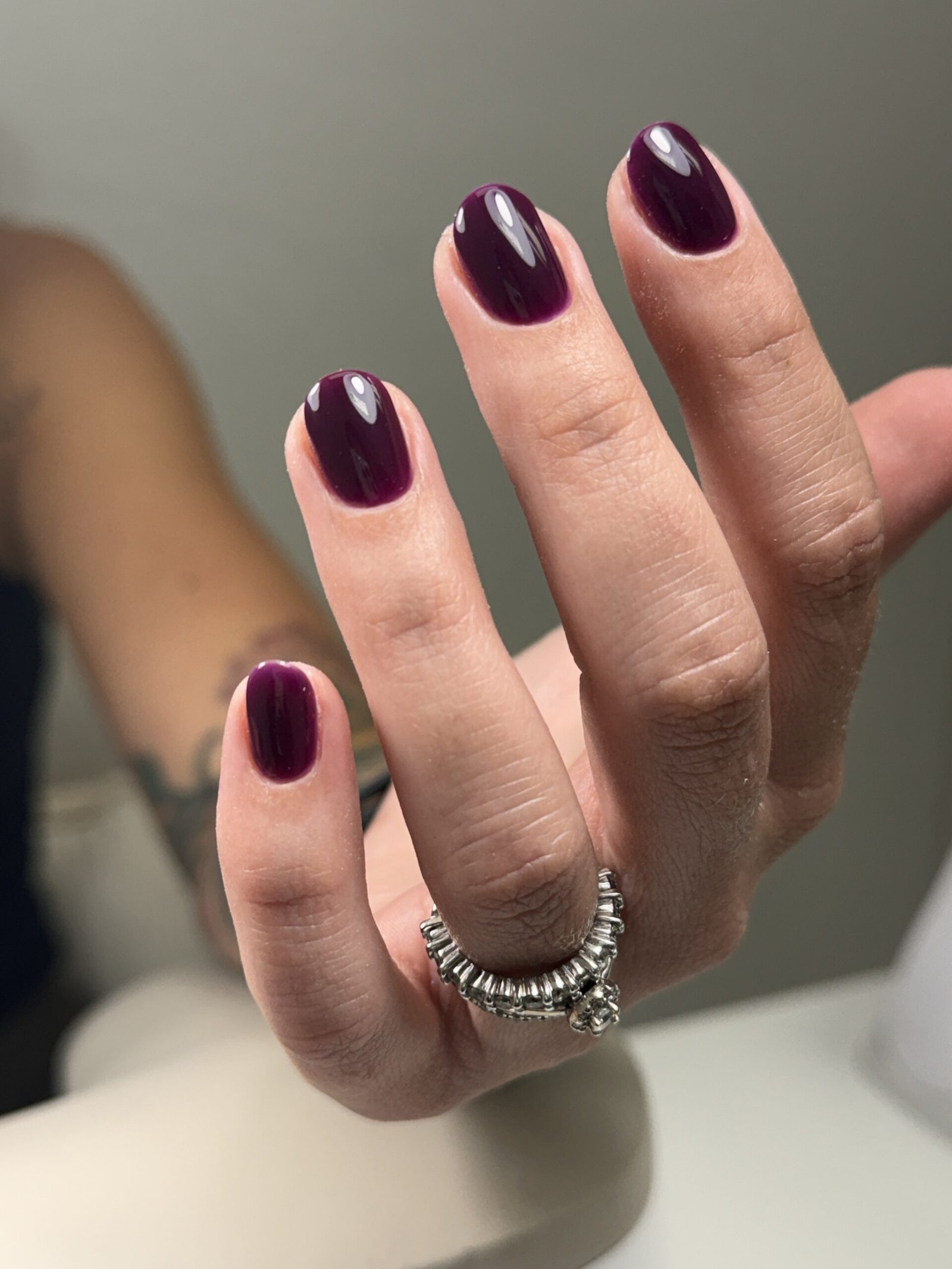 Deep burgundy builder gel manicure at Nail Boss Studio in Tampa, Florida