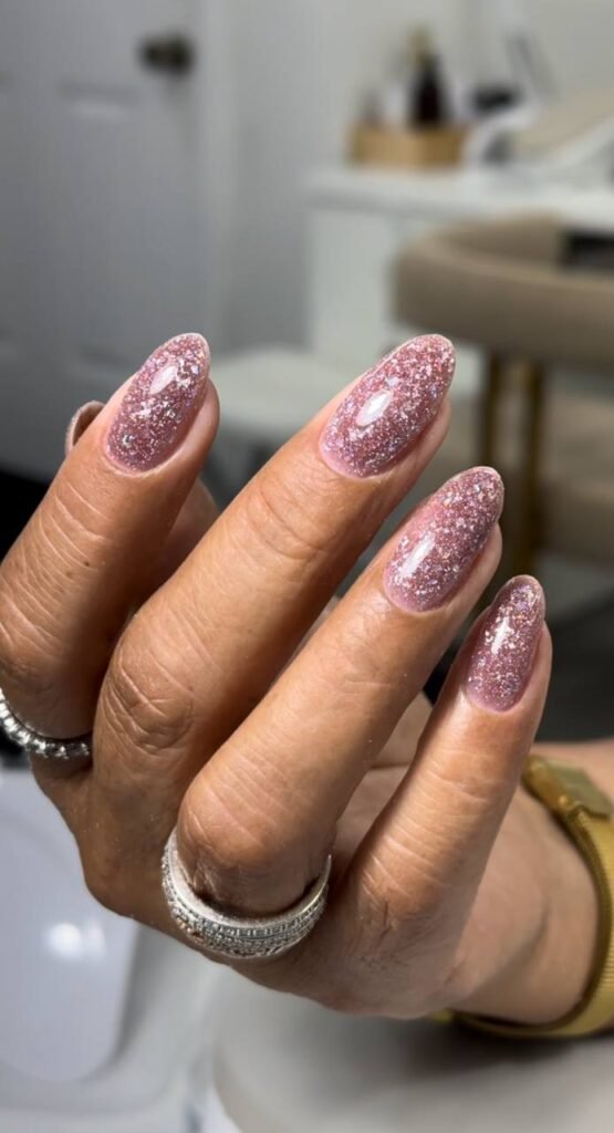 Elegant russian nails with soft pink shimmer finish at Nail Boss Studio Tampa, Florida.