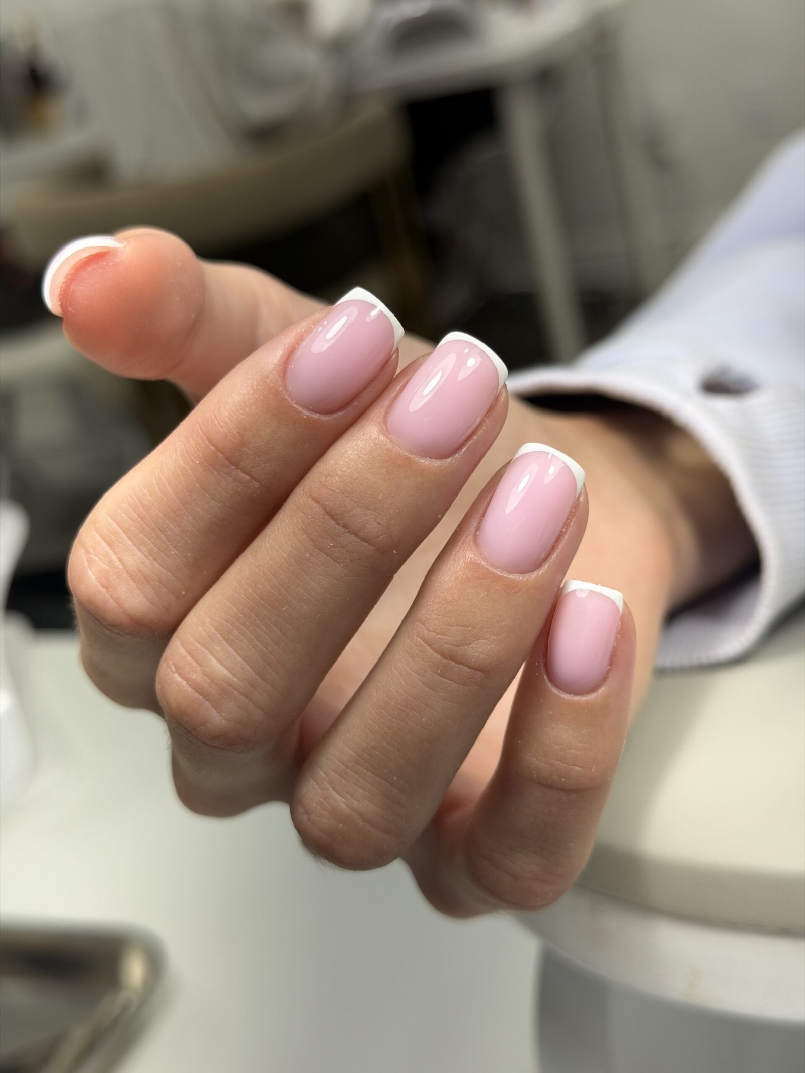 Classic european manicure with white tips at Nail Boss Studio in Tampa, Florida