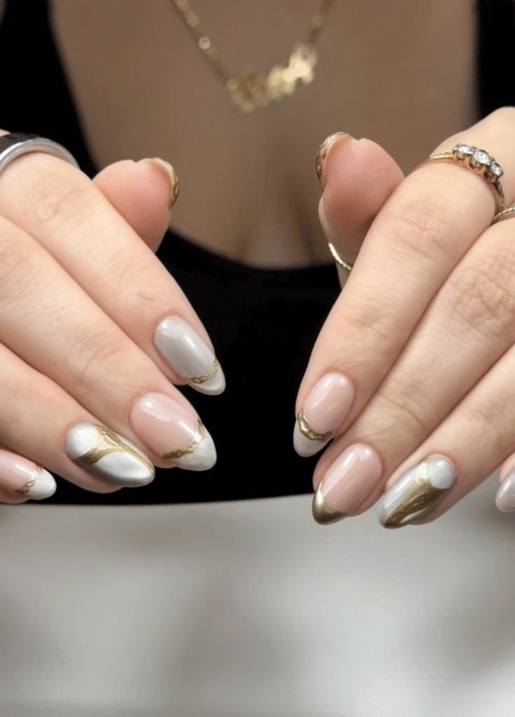 Elegant russian manicures near me with nude, chrome, and gold nail art at Nail Boss Studio Tampa, Florida.