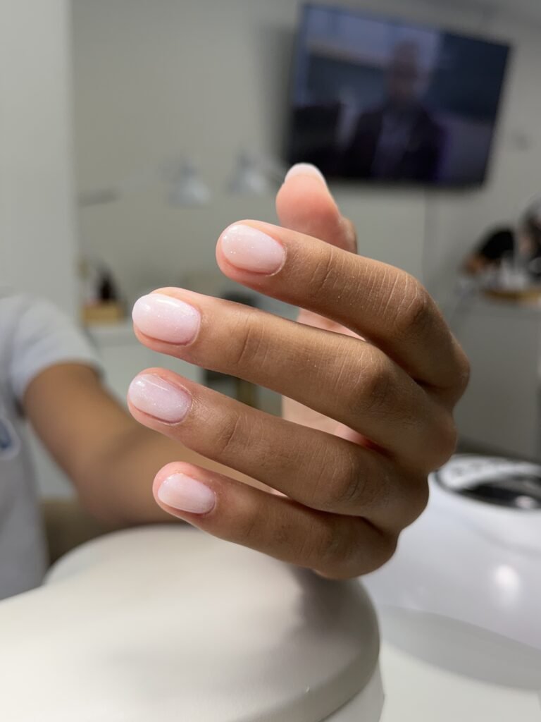 Elegant russian manicure with natural glossy nails at Nail Boss Studio Tampa in Tampa, Florida.