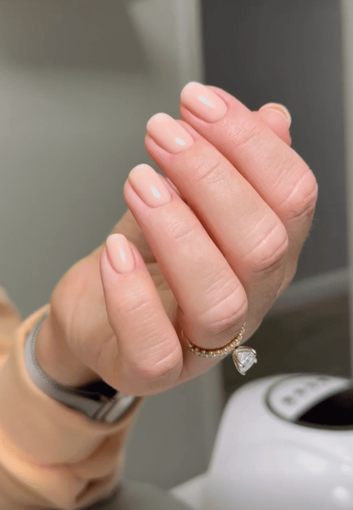Elegant nude russian manicures near me featuring a flawless natural finish at Nail Boss Studio Tampa, Florida.