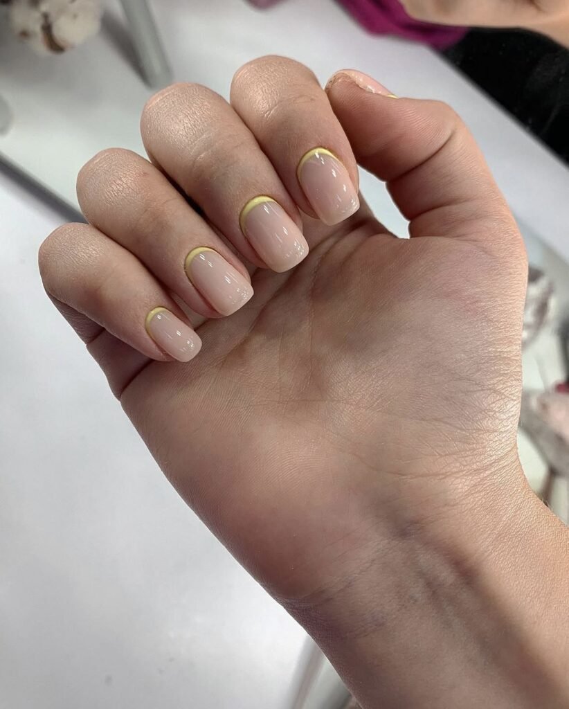 Close-up of taupe russian nails finished at Nail Boss Studio Tampa