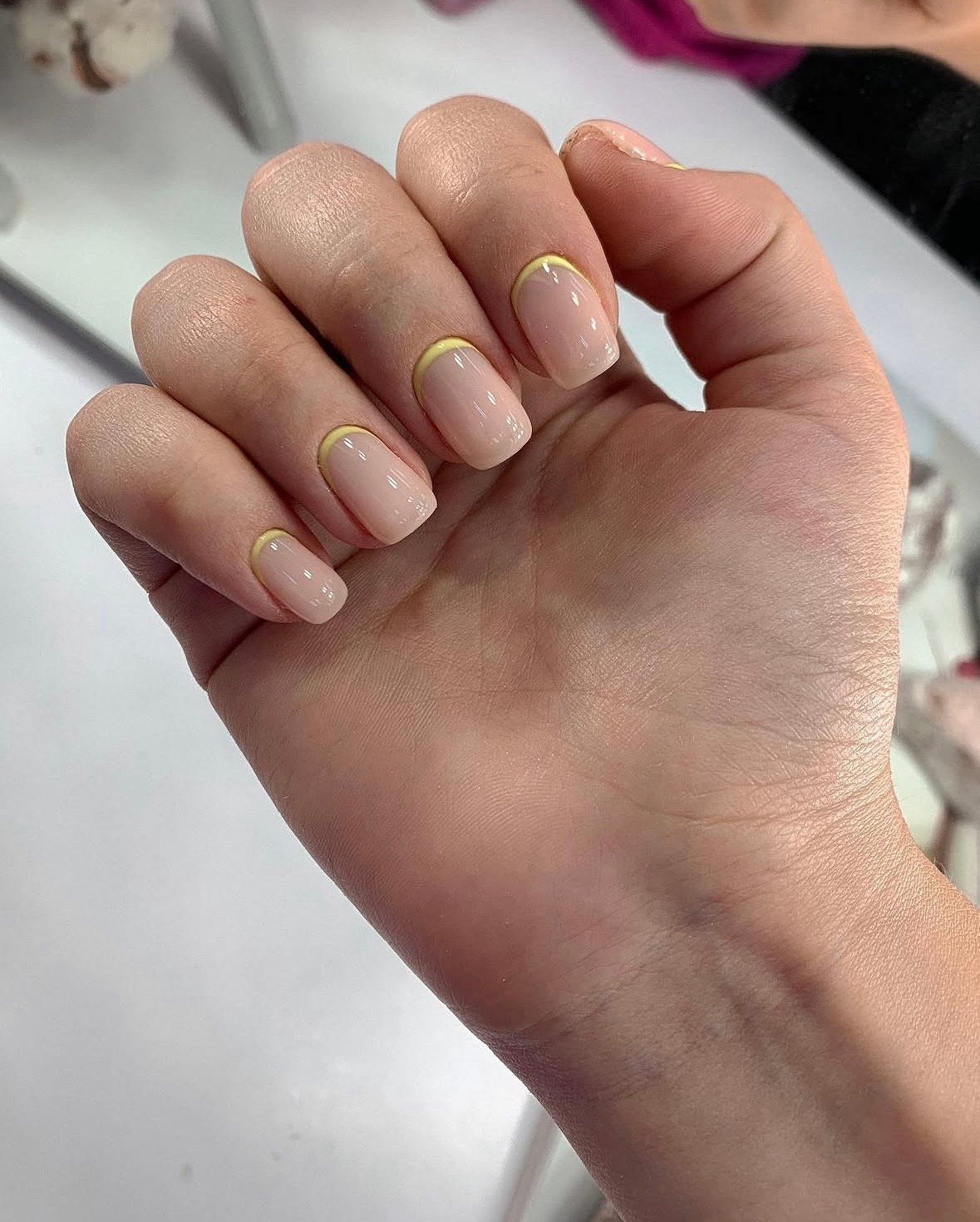 Close-up of taupe russian nails finished at Nail Boss Studio Tampa