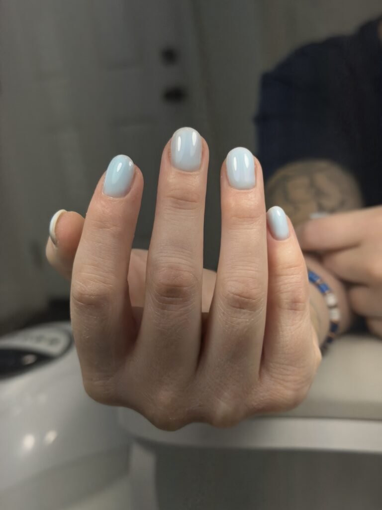 Soft blue russian nails tampa manicure with glossy finish at Nail Boss Studio Tampa, Florida.