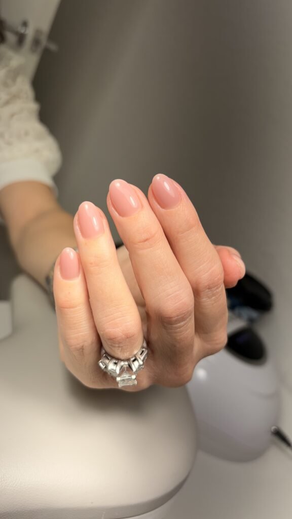 Elegant russian nails tampa with a soft nude almond manicure created at Nail Boss Studio Tampa, Florida.