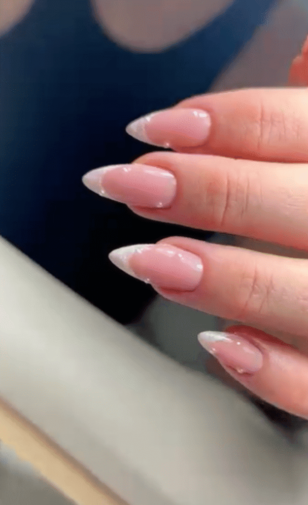 Elegant russian nails with soft almond French tips at Nail Boss Studio Tampa, Florida.