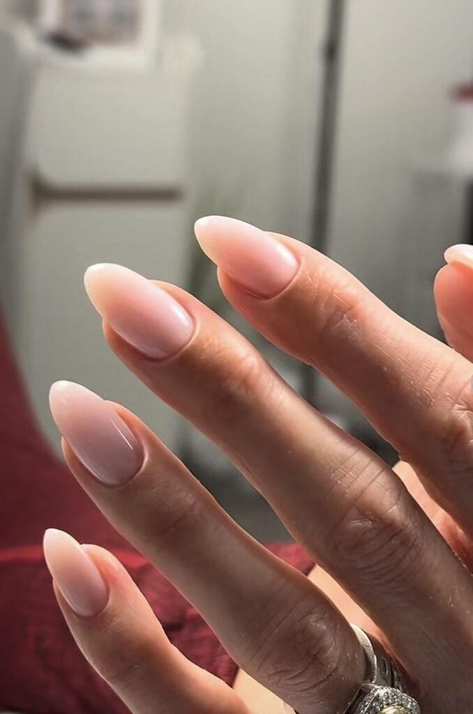 Close-up of burgundy dry manicure finished at Nail Boss Studio Tampa
