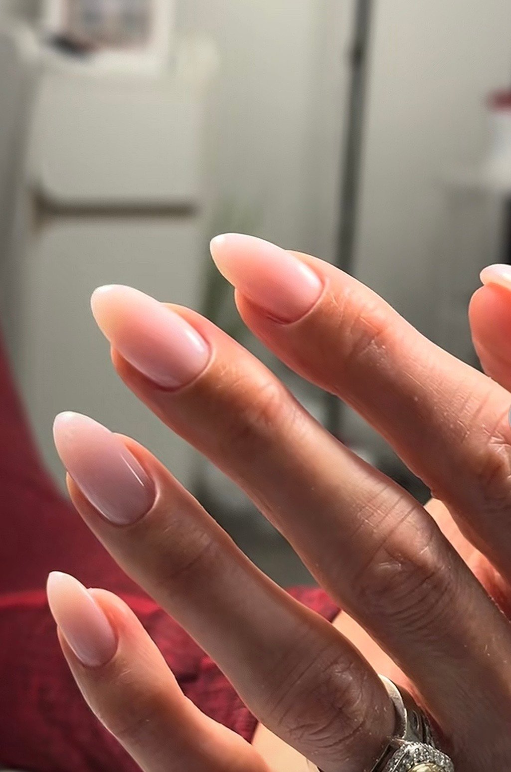 Close-up of burgundy dry manicure finished at Nail Boss Studio Tampa